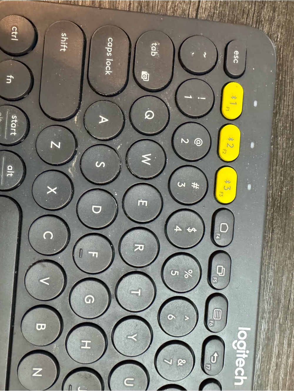 Logitech Black Wireless Keyboard with Yellow Function Key - Picture 5 of 9